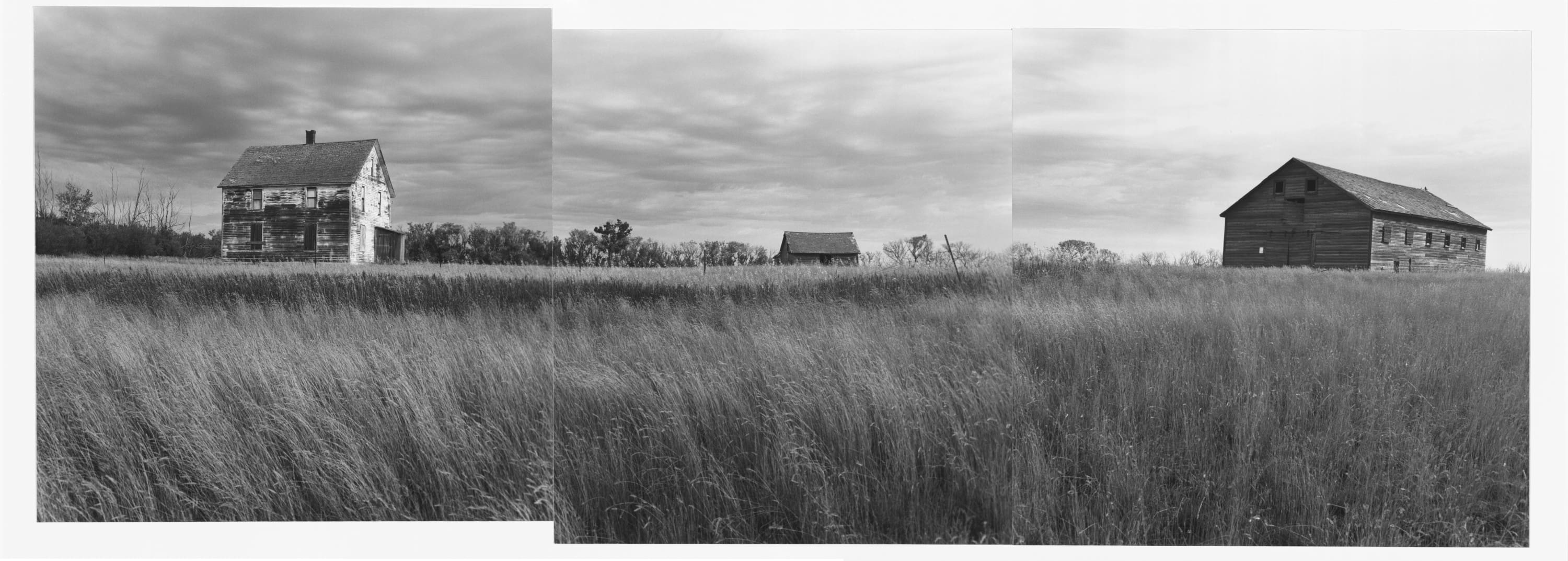 Three frame panorama prairie landscape with old house and barn.